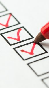 Checklist marked red with a red pen