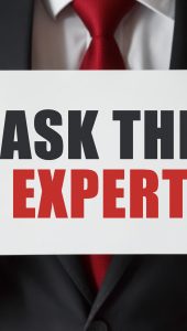 Businessman holding a card with text Ask the Expert
